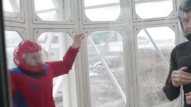 Man Exits The Wind Tunnel