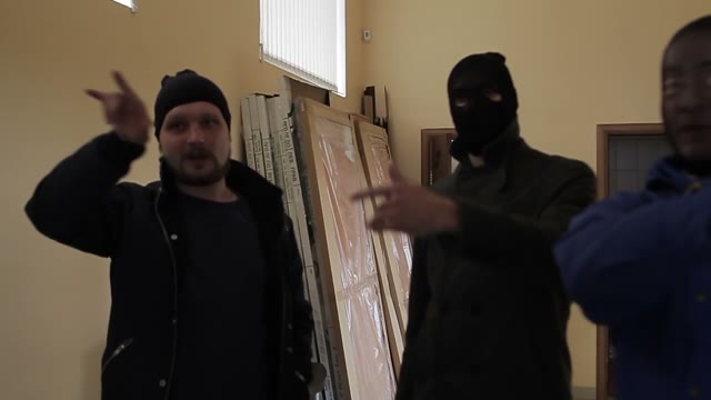 Men Discussing A Plan