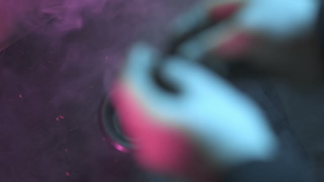Hands Strew Tobacco In The Chillum