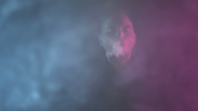 Man Let Out Smoke Rings