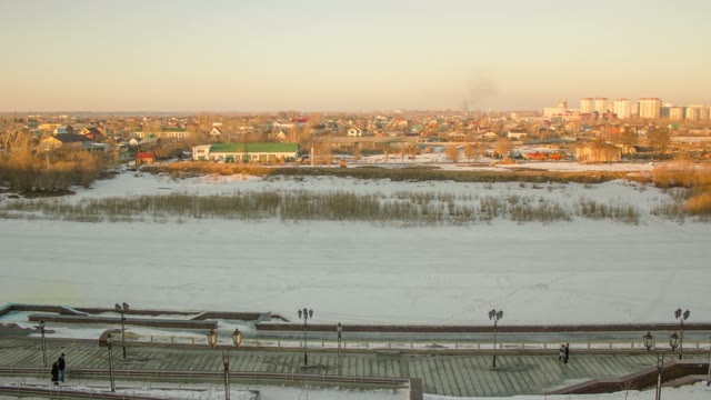 Frozen River And Winter Embankment