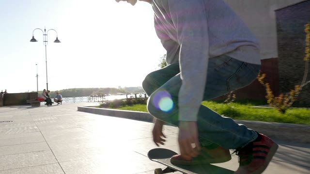 Skateboarder Does Flip At Sunset