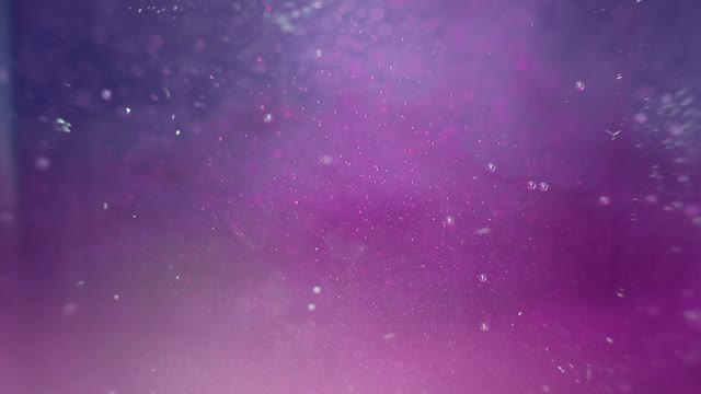 Particles In The Violet And Blue Water