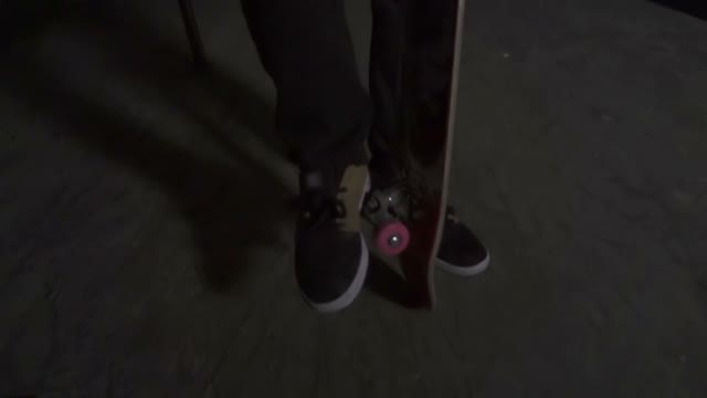 Young Skater Corrects Skateboard Wheels