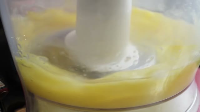 Blending Egg Yolks And Sugar With Help Of Modern Mixer