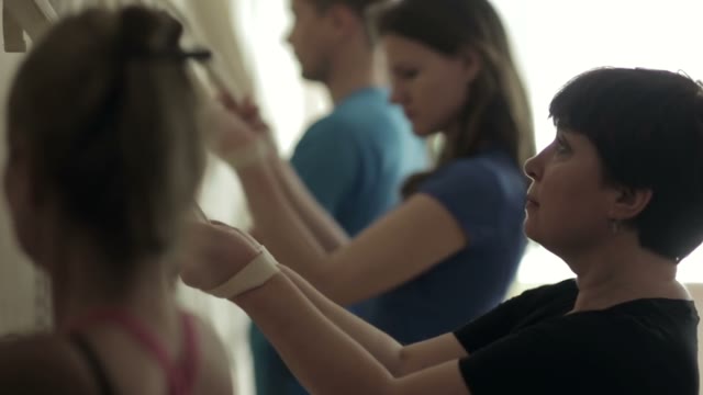 Group Of Students Performing Exercise