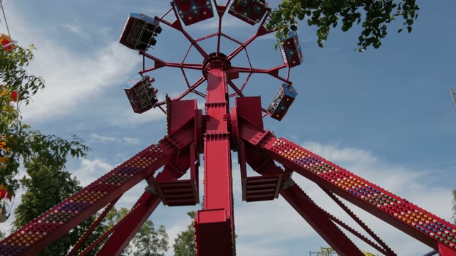 The Rotating Carousel In An Amusement Park