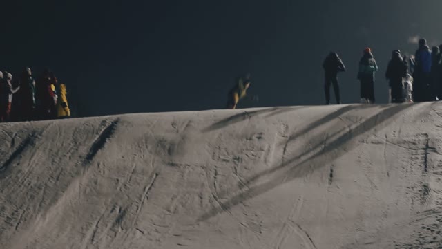 Snowboarder Doing Trick On The Slope