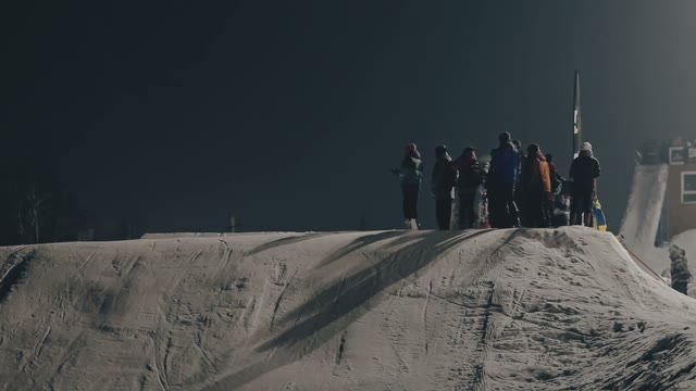 Snowboarder Doing Trick On The Slope
