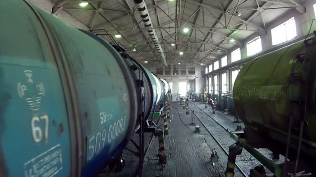 Many Trains In A Large Hangar