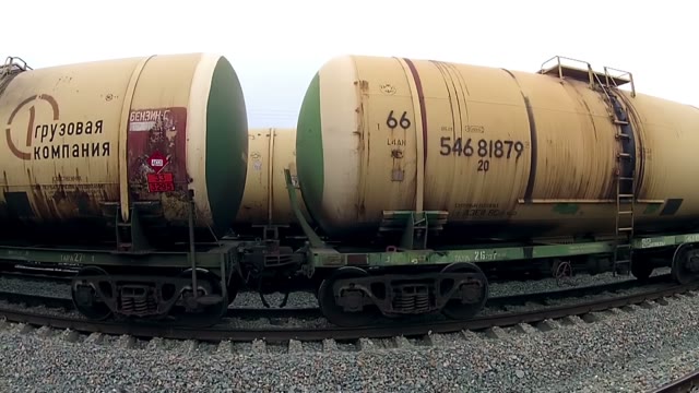 Long Freight Train Removes The Quadrocopter