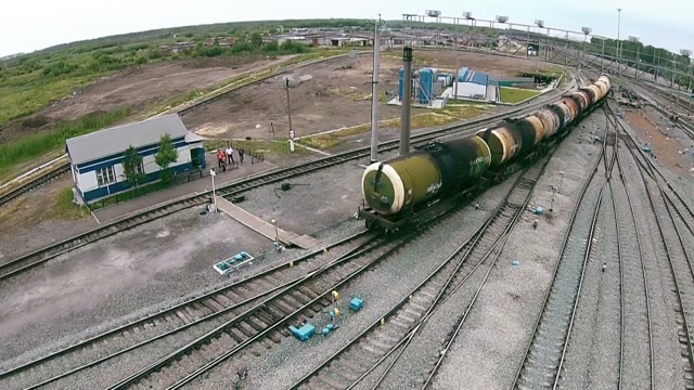 Quadrocopters Takes The Traveler On The Train Tracks Freight Train