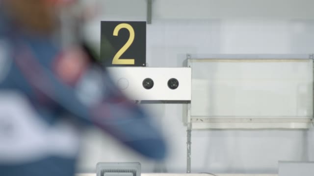 Biathlete Shoots At The Target