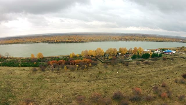 Panorama Of A Small Village Near The River