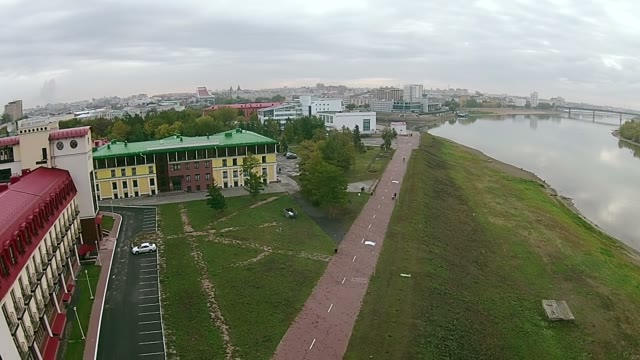 Quadrocopters Removes The Pedestrian Street Along The River