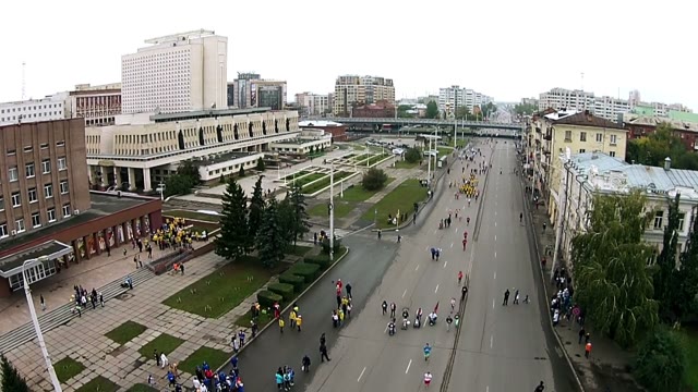 People Run A Marathon On The Main Street