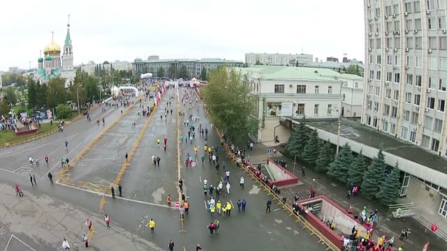 Young People Run A Marathon On The High Street