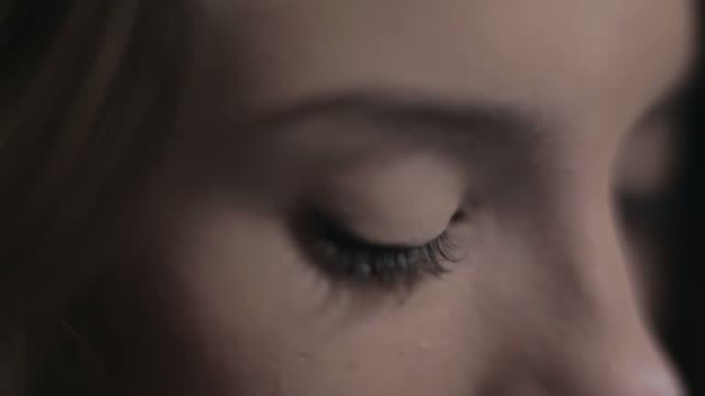Young Beautiful Woman. Lips And Eyes Closeup
