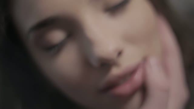 Man Gently Stroking The Woman's Face