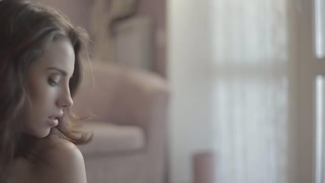 Woman And Man Sitting Back To Back