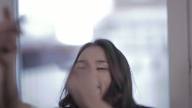 Beautiful Young Woman Laughing And Showing Obscene Gestures