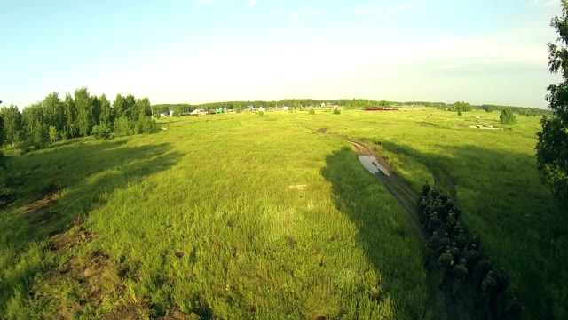 Quadrocopters Shoots Soldiers Running On The Road