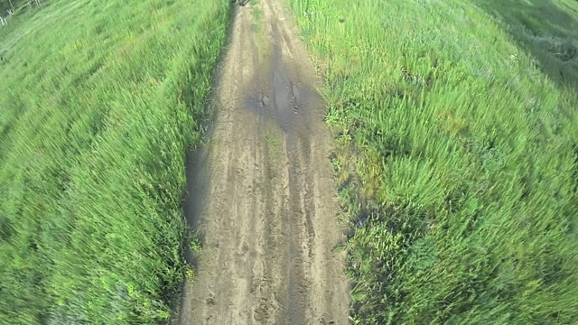 A Military Officer Goes On The Road In A Field