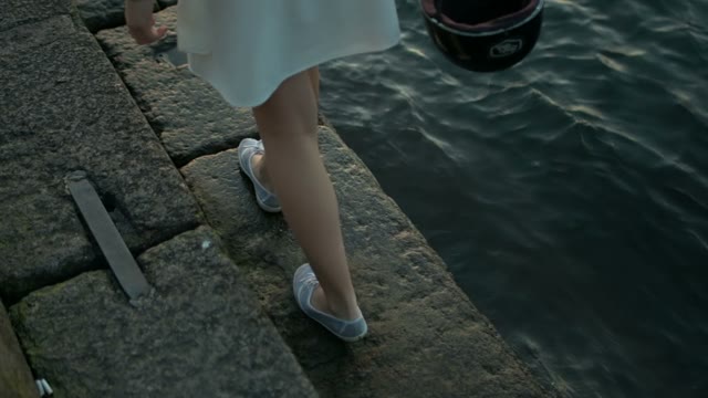 Young Beautiful Woman Walking On Quay