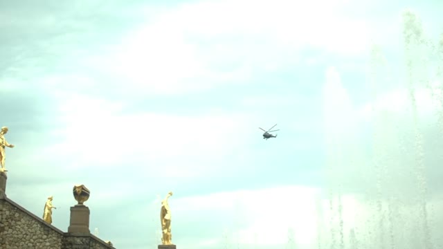 Helicopter Flies Over The Fountains In St Petersburg