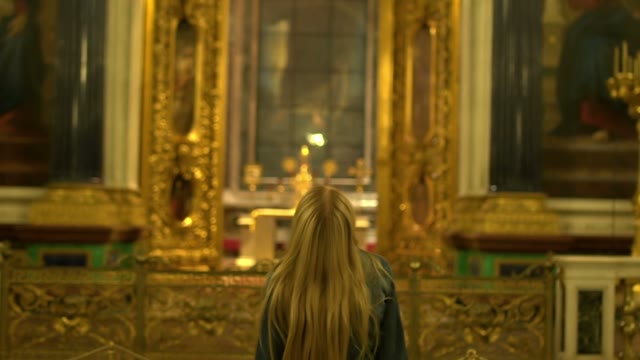Young Blond Woman In Church