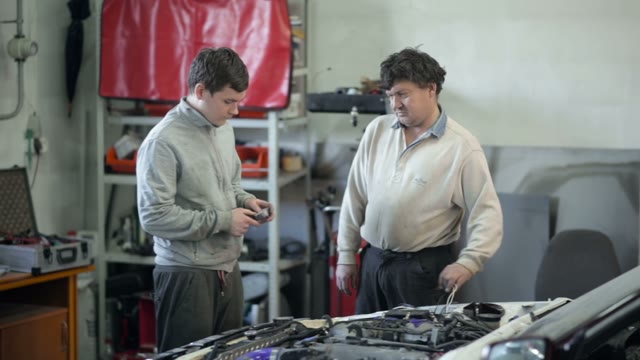 Mechanic Doing Work In The Repair Shop