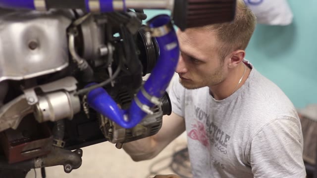 Experienced Mechanic Inspect The Car Engine