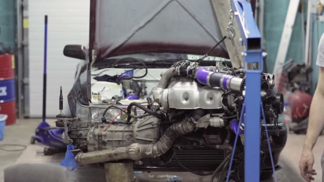 Repair Of Of The Engine Cars In A Car Workshop