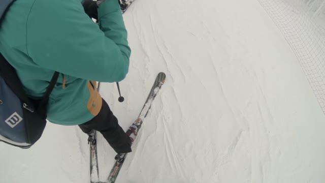 Snowboarder Preparing To Ride On A Slope