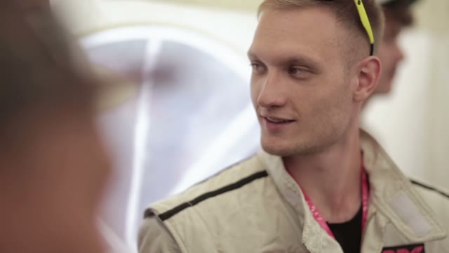 Rider Discussing Something With The Team