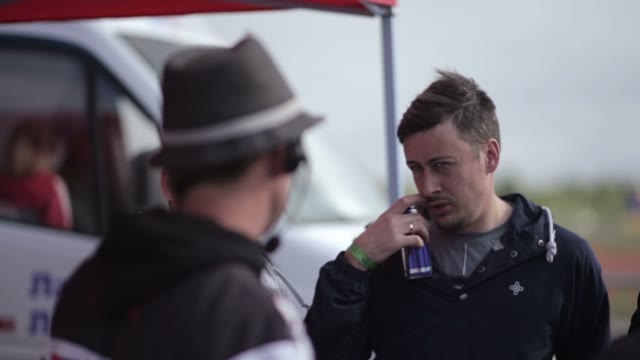 Man Talk About Something With The Racing Judges