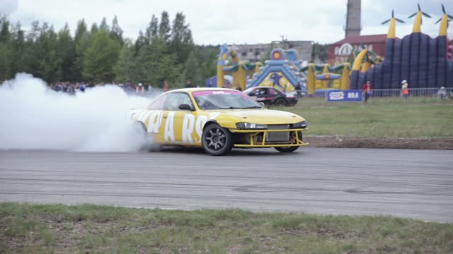 Driver Enters The Controlled Drift In His Car
