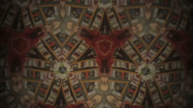 Young Blonde Girl In A Kaleidoscope