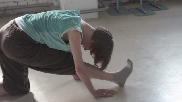Pretty Redhead Girl Doing Legs Workout