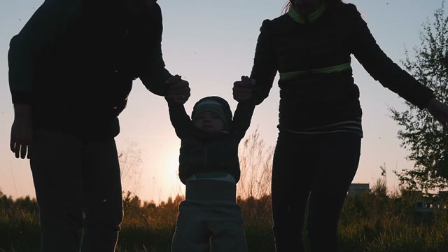 Family Playing With A Baby