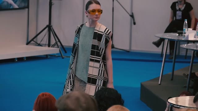 Fashion Show. Female Models In Dresses Go On The Catwalk