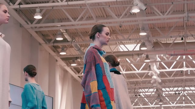 Fashion Show. Female Models In Dresses Go On The Catwalk