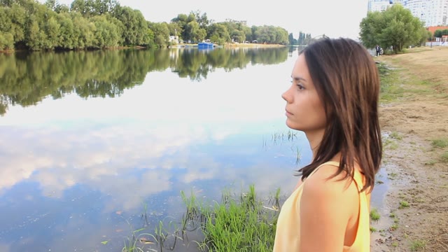 Young Woman Dancing By The River