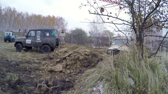 Off-road Car Driving On A Dirt Road