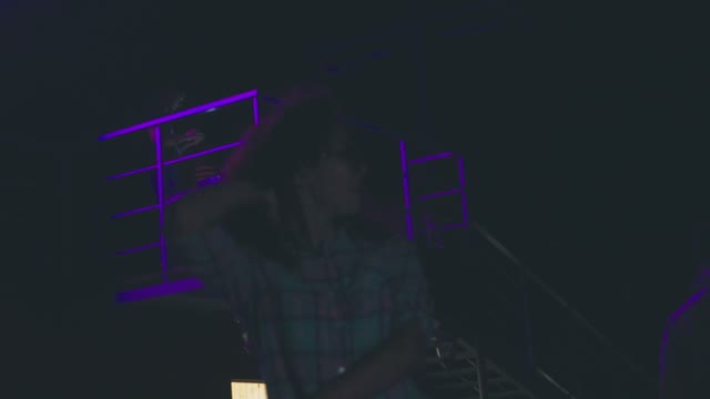 Girl Dancing At A Concert At Night In Outdoor