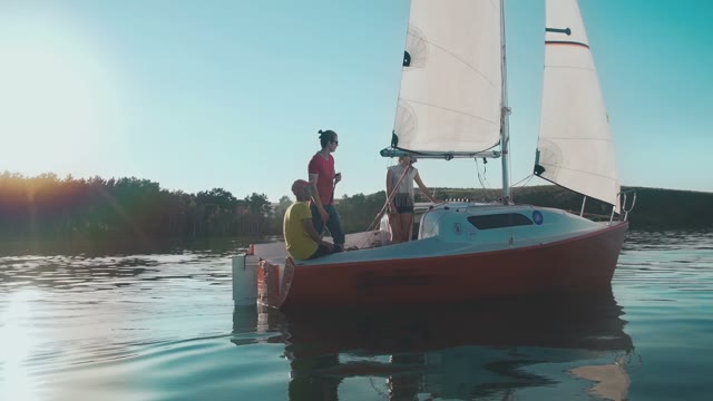 Young People're Sailing In The Bay