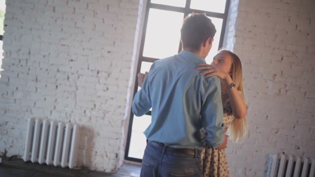 Young Couple In Love Is Learning To Dance In The Studio