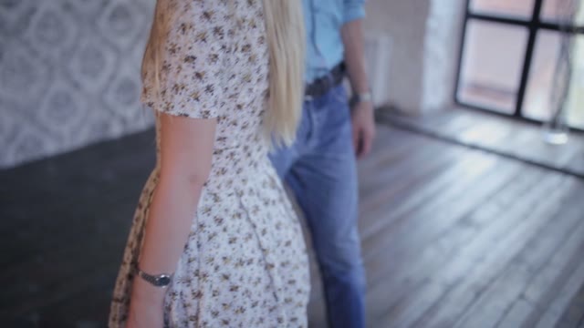 Elegant Couple In Love Is Learning To Dance In The Studio