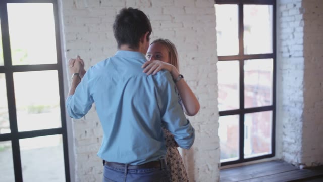 Beautiful Couple In Love Is Learning To Dance In The Studio