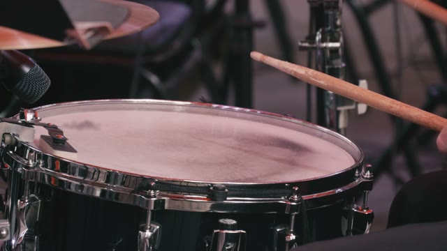Man Playing The Drums